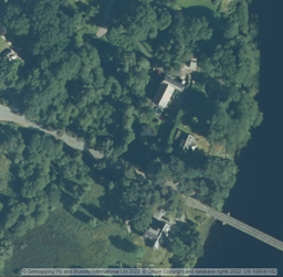 Ariel image of trees and ground of property
